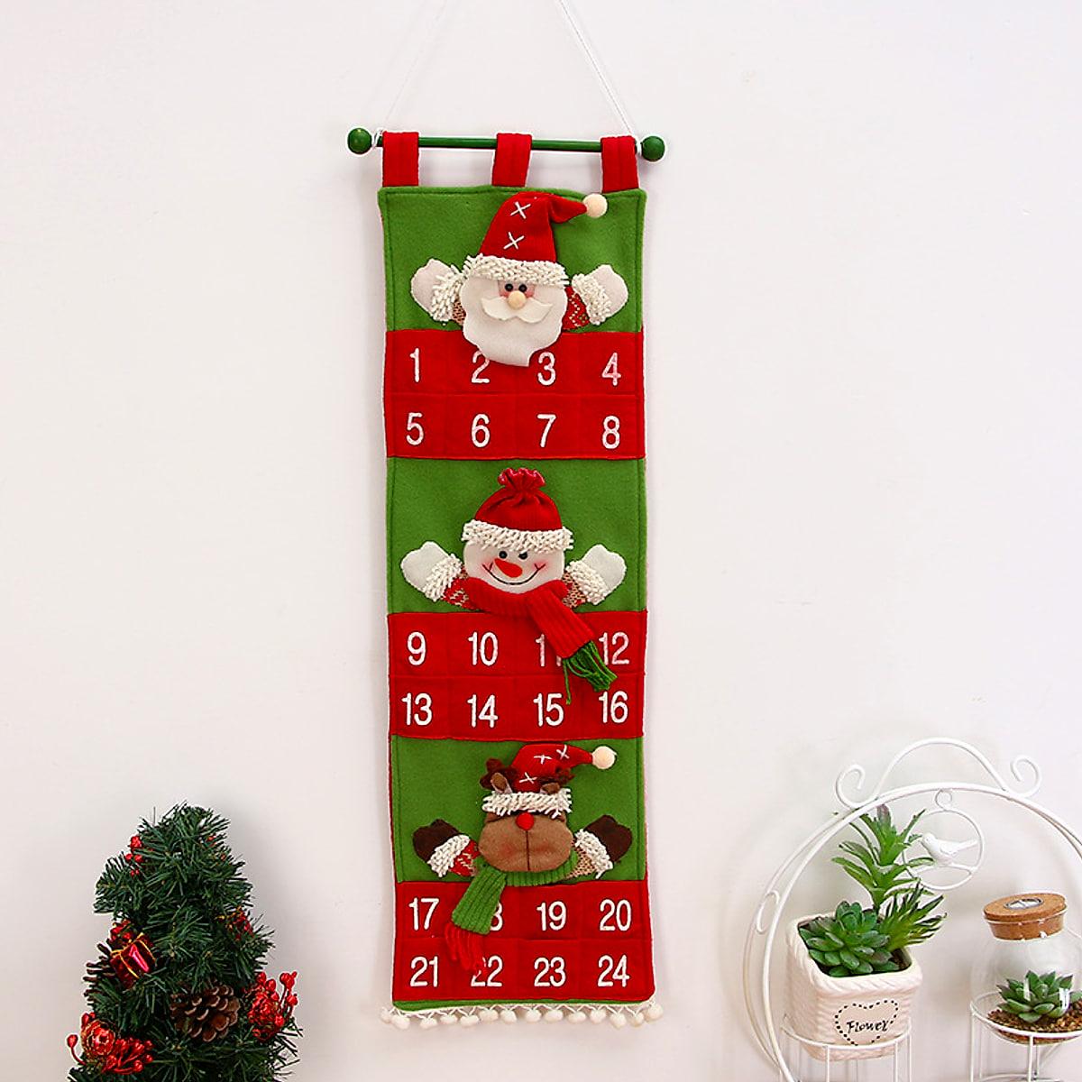 Hängande adventskalender i tyg med fickor att fylla