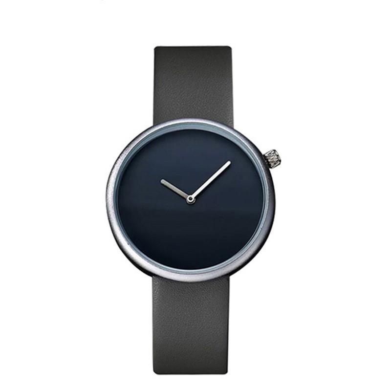 Enkel unisexklocka med 40 mm urtavla och armband i PU