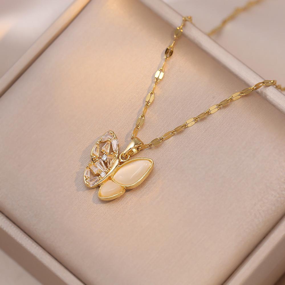 Halsband med fjäril i opal – guld- eller stålfärgat