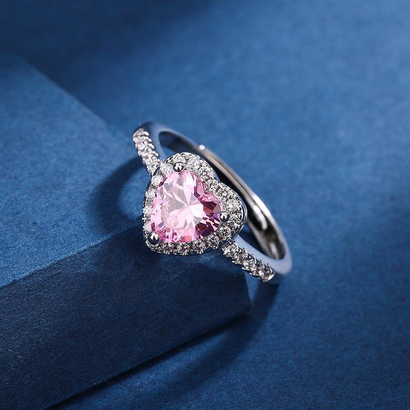 Justerbar ring med hjärtformad sten och zirkoner – rosa eller vit