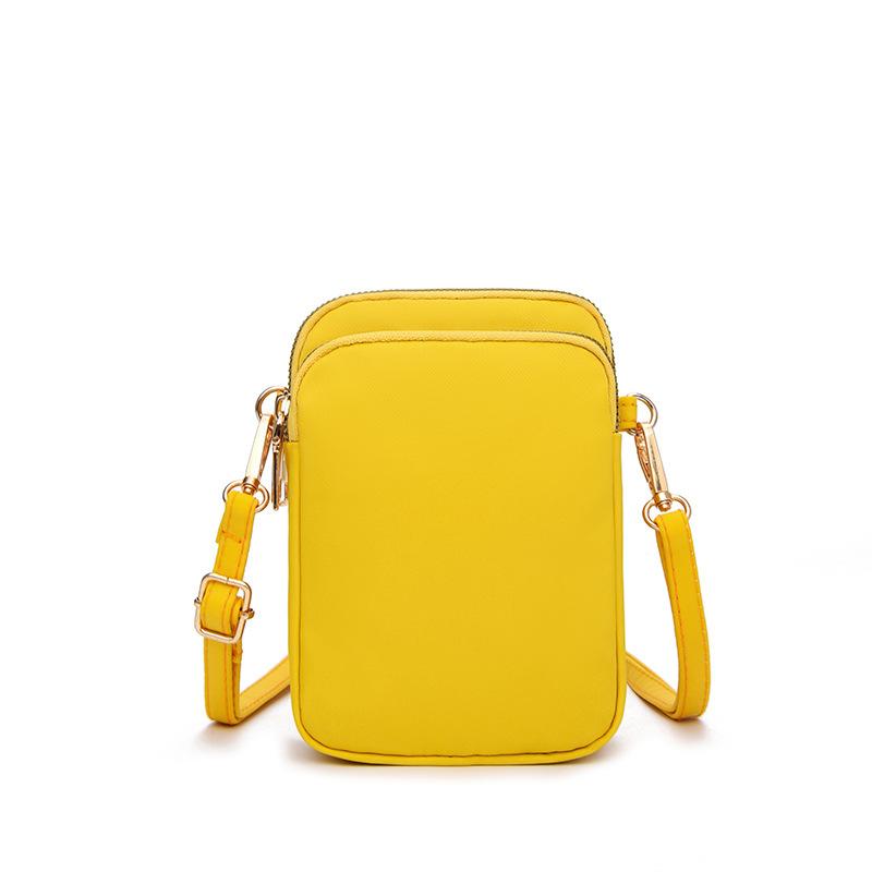 Liten mobilväska i oxfordtyg med tre fack – crossbody