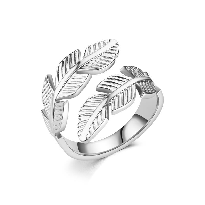 Öppen ring formad som fjädrar – titanstål, guld eller silver