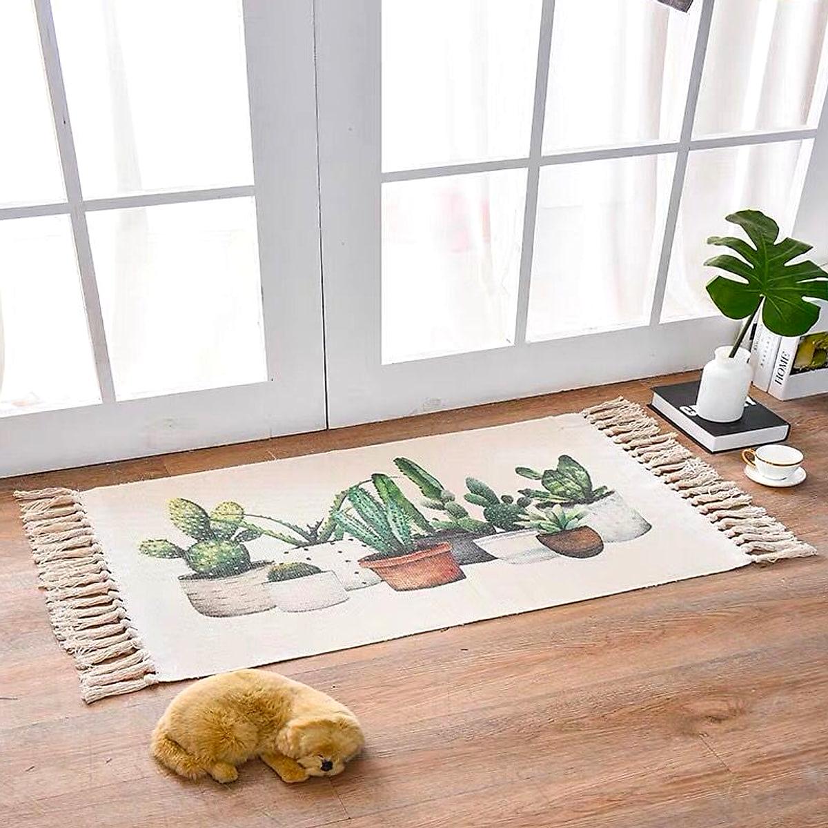 Handvävd matta i bomull och linne med tofsar – 60 × 90 cm